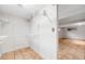 Spacious closet offering ample storage space and easy access to other rooms at 7382 E Bates Dr, Denver, CO 80231