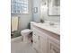 Elegant bathroom with a modern vanity, stylish fixtures, and mosaic tile floor, exuding sophisticated charm at 3051 W 39Th Ave, Denver, CO 80211