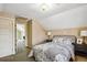 Serene bedroom showcasing a plush bed with patterned linens, and doorway into a bright office area at 3051 W 39Th Ave, Denver, CO 80211