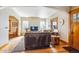 A comfortable living room has wood floors, neutral paint and ample natural light at 3051 W 39Th Ave, Denver, CO 80211
