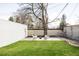 Grassy backyard with an outdoor seating area, perfect for enjoying the outdoors at 4420 W 27Th Ave, Denver, CO 80212