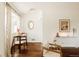 Cozy dining area with natural light, a round table, and stylish decor at 4420 W 27Th Ave, Denver, CO 80212