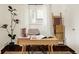 An office space features a desk, chair, natural light and wood floors at 4420 W 27Th Ave, Denver, CO 80212
