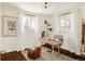 Bright office with ample natural light from two windows, and a modern desk and decor at 4420 W 27Th Ave, Denver, CO 80212