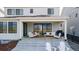 Back porch featuring outdoor seating, offering relaxation and entertainment space at 8939 Bellsong Cir, Littleton, CO 80125