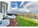 Backyard featuring well-maintained lawn, landscaping and outdoor space, perfect for outdoor enjoyment at 8939 Bellsong Cir, Littleton, CO 80125