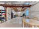 Unfinished basement with exposed ceiling and concrete floor, offering potential for customization at 8939 Bellsong Cir, Littleton, CO 80125