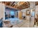 Unfinished basement with sauna and exposed ceiling, offering potential for customization at 8939 Bellsong Cir, Littleton, CO 80125