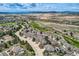 Aerial view of community featuring tree lined streets, a community pool, and a golf course at 3109 Newport Cir, Castle Rock, CO 80104