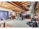 Unfinished basement with exposed ceilings, concrete walls, and potential for customization at 3109 Newport Cir, Castle Rock, CO 80104