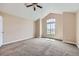 Spacious bedroom with vaulted ceiling, large window and neutral carpet at 3109 Newport Cir, Castle Rock, CO 80104
