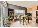 Bright breakfast nook with a large window and seating for four at 3109 Newport Cir, Castle Rock, CO 80104