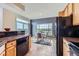 Bright breakfast nook with large windows offering scenic views and a cozy dining area at 3109 Newport Cir, Castle Rock, CO 80104