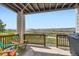 Enjoy outdoor living on this patio with colorful chairs and a golf course view at 3109 Newport Cir, Castle Rock, CO 80104
