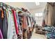 Walk-in closet features ample storage, including shelving and hanging space at 3109 Newport Cir, Castle Rock, CO 80104