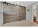 Bedroom with Sliding barn doors that add a rustic and modern flair at 6719 Quay St, Arvada, CO 80003