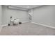 Finished basement room with a workspace and carpet at 7301 E 82Nd Pl, Commerce City, CO 80022