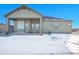 House exterior, back view with patio at 7301 E 82Nd Pl, Commerce City, CO 80022