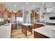 Modern kitchen, featuring stainless steel appliances and an island at 7301 E 82Nd Pl, Commerce City, CO 80022