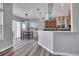 Modern kitchen with stainless steel appliances and an island at 7301 E 82Nd Pl, Commerce City, CO 80022