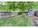 Spacious backyard featuring a shed and a wooden fence for added privacy at 4301 Zuni St, Denver, CO 80211
