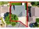 Aerial view of a property highlighting the yard, roof, and surrounding neighborhood at 1545 August Ln, Brighton, CO 80601