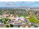 Aerial view shows neighborhood schools, Northeast Elementary and Overland Trail Middle at 1545 August Ln, Brighton, CO 80601