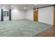 Spacious basement featuring modern carpet, neutral walls, and a window with natural light at 1545 August Ln, Brighton, CO 80601