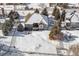 Aerial view of house and snowy backyard at 1430 Milbury St, Castle Rock, CO 80104