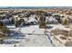 Aerial view of house and snowy backyard at 1430 Milbury St, Castle Rock, CO 80104