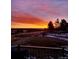 Deck view of sunset over snowy landscape at 1430 Milbury St, Castle Rock, CO 80104