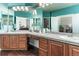 Bathroom with double vanity and view into bedroom at 1430 Milbury St, Castle Rock, CO 80104