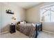 Cozy bedroom with double bed and window at 1430 Milbury St, Castle Rock, CO 80104