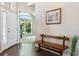 Bright and spacious entryway with hardwood floors and a wooden bench at 1430 Milbury St, Castle Rock, CO 80104