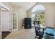 Bright home office features built-in shelving and large window at 1430 Milbury St, Castle Rock, CO 80104