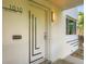 Stylish front door with modern design elements and house number '1010' is a welcoming entrance to this lovely home at 1010 N Jasmine St, Denver, CO 80220