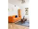 Cozy living room with herringbone floors, sleek furniture, and modern lighting at 1010 N Jasmine St, Denver, CO 80220