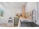 Updated kitchen has butcher block countertops, stainless steel sink, and stainless steel appliances at 4636 Leaf Ct, Denver, CO 80216