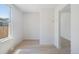 Bright living room features new laminate wood flooring, fresh paint, and abundant natural light from the updated window at 4636 Leaf Ct, Denver, CO 80216
