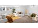 Spacious basement area offering multiple seating options and ample room for relaxation and entertainment at 3206 S Clayton St, Denver, CO 80210