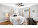 Bedroom with a ceiling fan, natural lighting, and an accent chair at 3206 S Clayton St, Denver, CO 80210