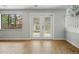 Bright and airy living room with large windows and access to the backyard at 4961 W 98Th Ave, Westminster, CO 80031