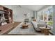 Bright living room with modern decor, vaulted ceilings, and large windows offering plenty of natural light at 4961 W 98Th Ave, Westminster, CO 80031