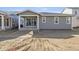 Backyard featuring a covered patio with sliding glass doors, perfect for outdoor entertaining at 24719 E 39Th Ave, Aurora, CO 80019