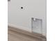 Laundry hook-ups and ductwork in a large closet on a light-colored wood floor at 24719 E 39Th Ave, Aurora, CO 80019