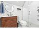Modern bathroom with a stylish vanity and a glass-enclosed shower, offering a luxurious feel at 3938 Kalamath St, Denver, CO 80211