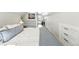 Bedroom featuring a view of the door to the balcony, accentuated with stylish decor elements at 3938 Kalamath St, Denver, CO 80211