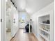 Hallway featuring a desk and the access to the balcony, accentuated with decor elements at 3938 Kalamath St, Denver, CO 80211