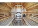 Inside the sauna, there are tiered seating and an electric heater, creating a relaxing atmosphere at 3938 Kalamath St, Denver, CO 80211