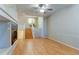 Living room showcases hardwood floors, a fireplace, and stairs to upper level at 9861 E Carolina Pl, Aurora, CO 80247